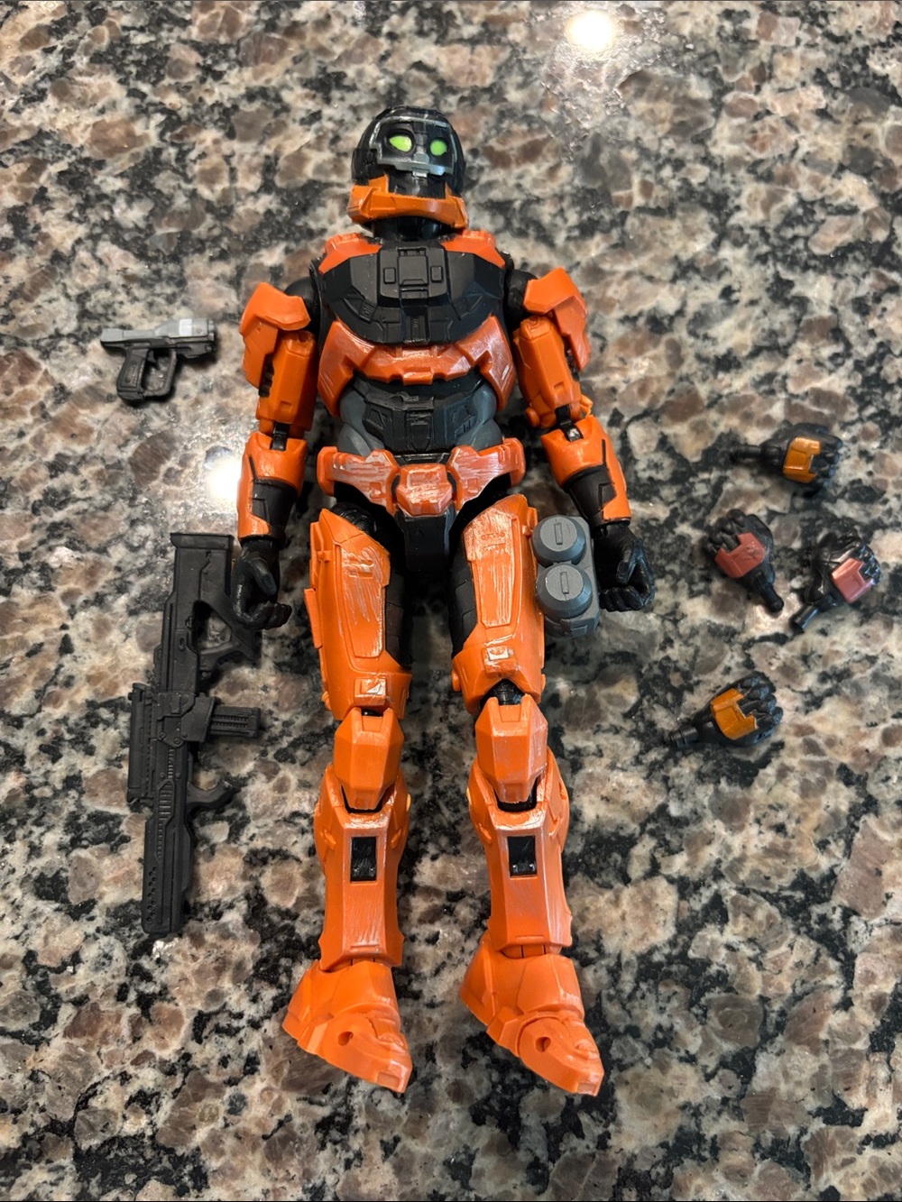 Orange & Black Action Figure with Interchangeable Hands and Weapons
